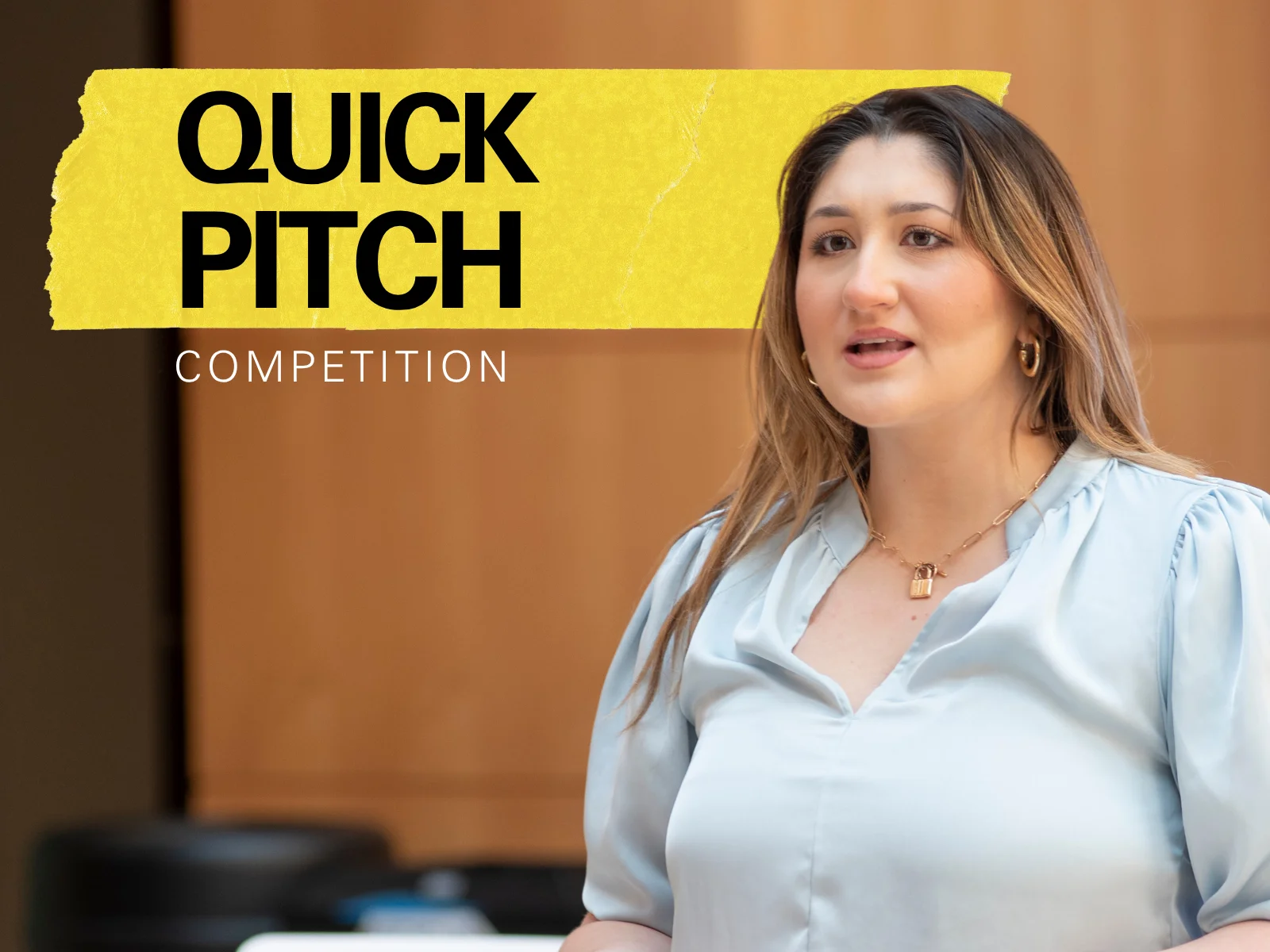 Woman pitching in professsional attire